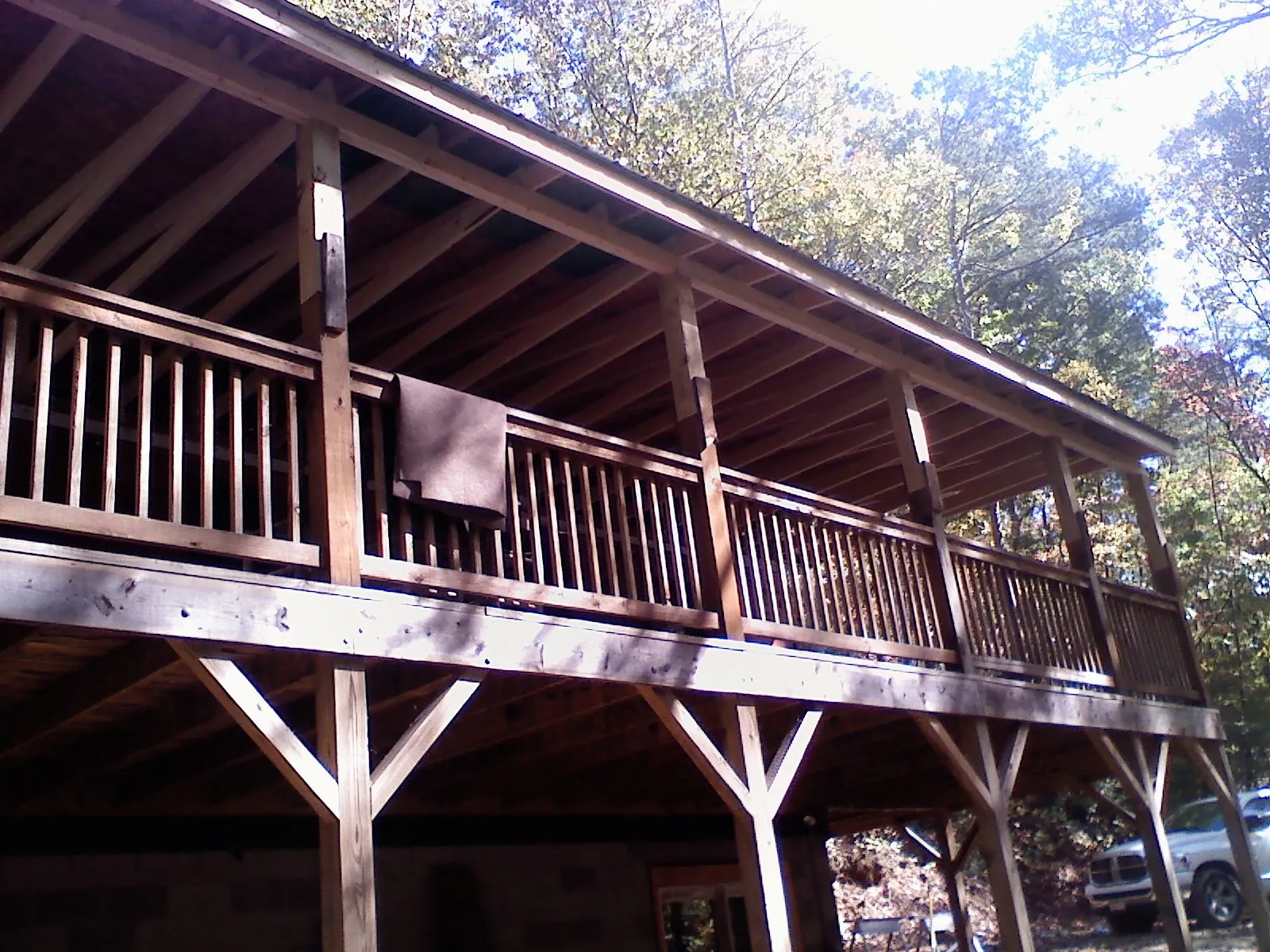 Timber framing under a new elevated porch and deck — Roof Leak Repair in Laughlintown by Roofing Brothers